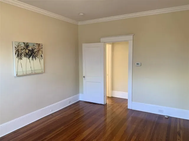 a kitchen with a sink cabinets and a window