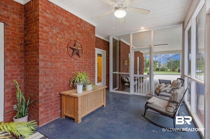 24541 Baldwin Beach Expressway Robertsdale, AL 36567 - Photo 37 of 51 Sunroom with a ceiling fan