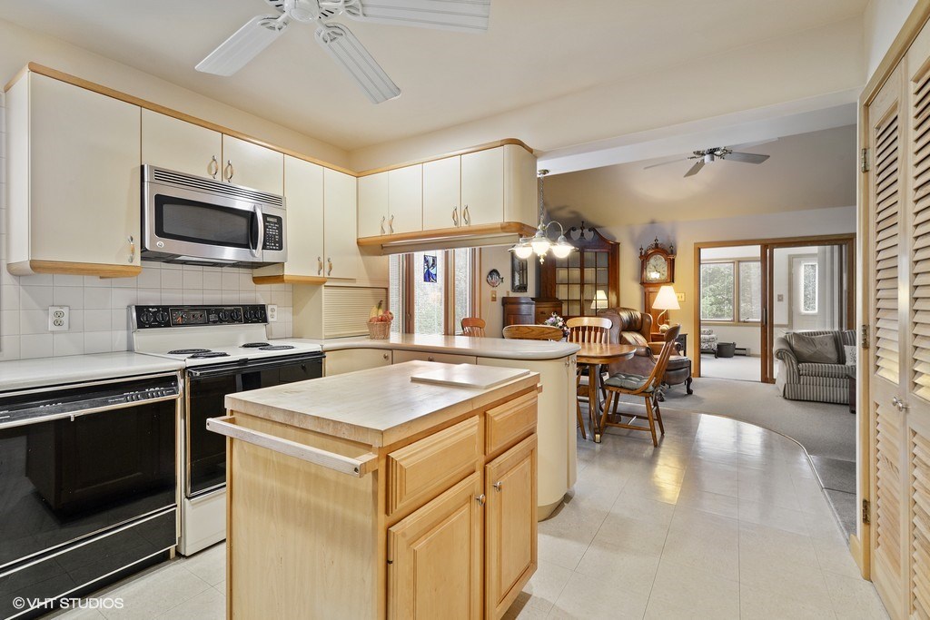 140 West Beach Road Charlestown, RI 02813 - Photo 5 of 15 The kitchen features custom cabinetry, corian counters, plenty of storage closets and a first floor laundry area.