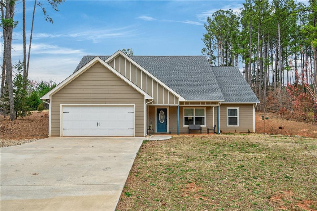 front view of a house with a yard