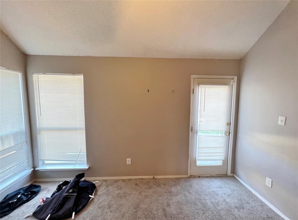 112 Walnut Lane Rockwall, TX 75032 - Photo 16 of 19 an empty room with windows