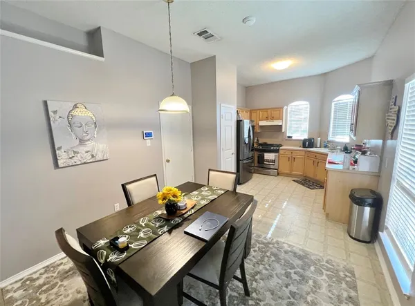 a view of a dining room with furniture