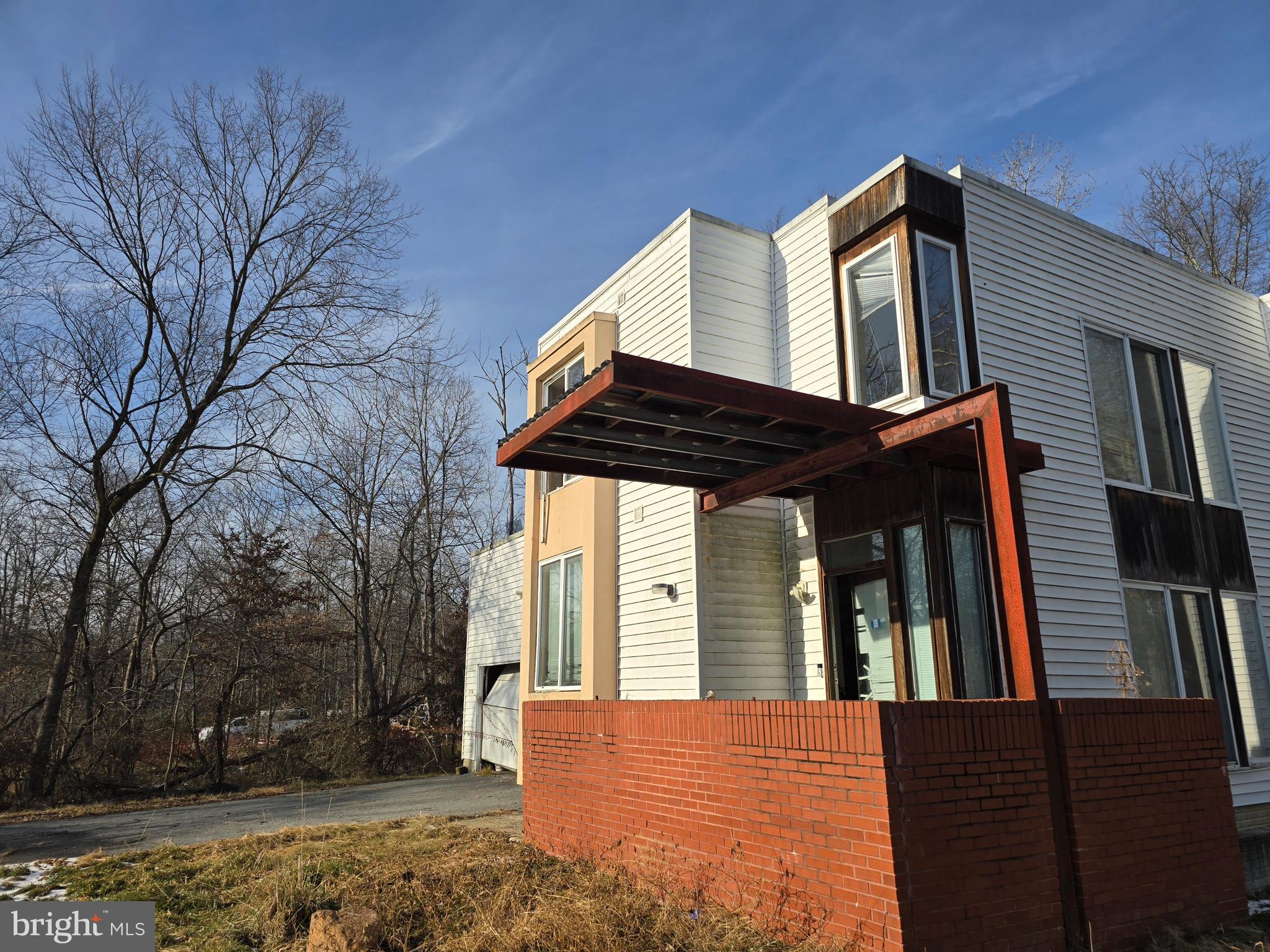 4814 Oakland Park Road Randallstown, MD 21133 - Photo 2 of 5 a view of a house with a large window