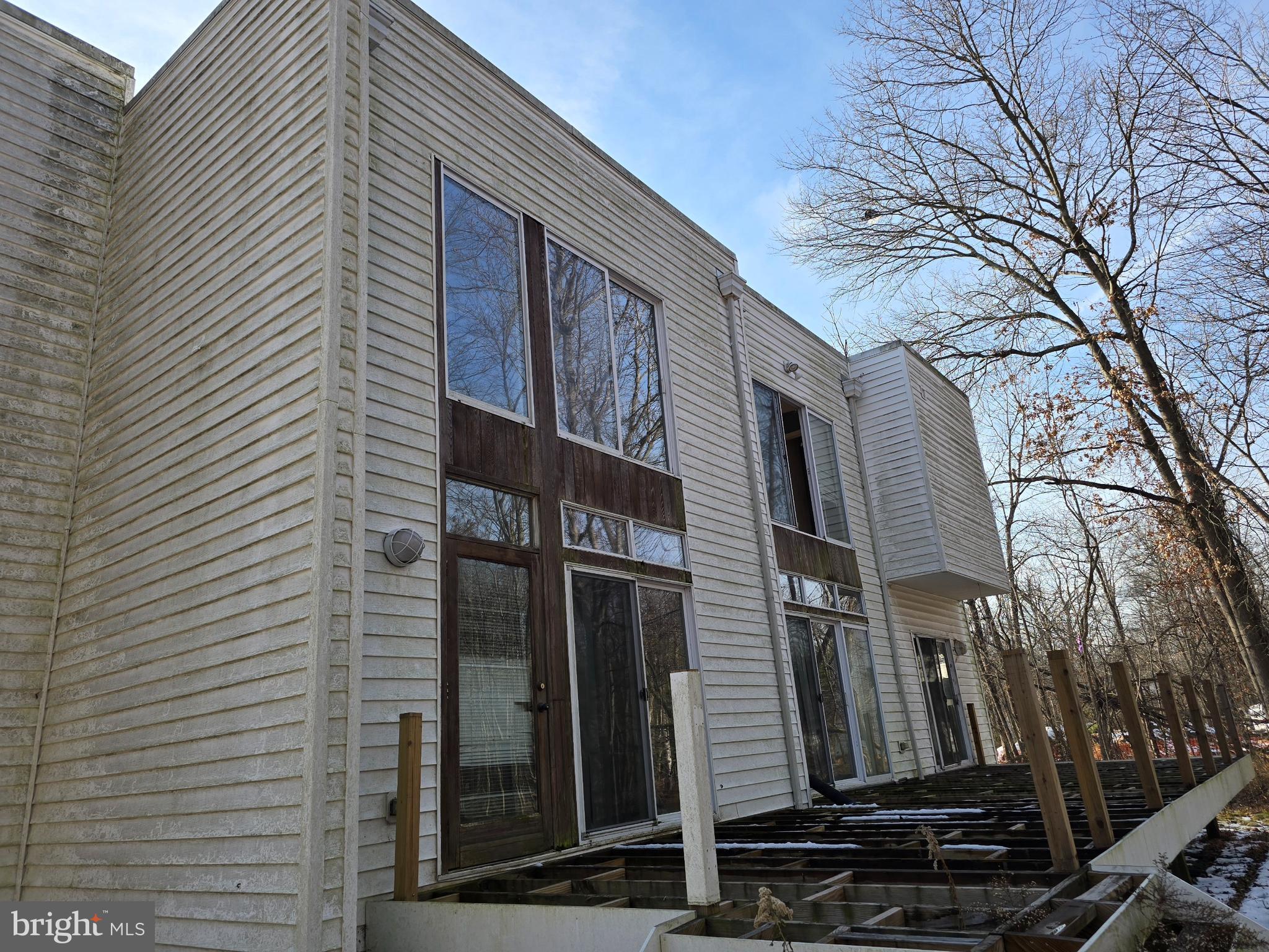 4814 Oakland Park Road Randallstown, MD 21133 - Photo 4 of 5 a view of a pathway along the building