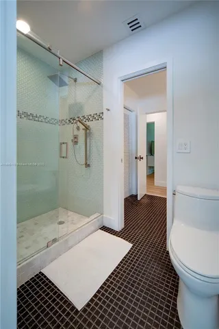 a bathroom with a sink and a shower