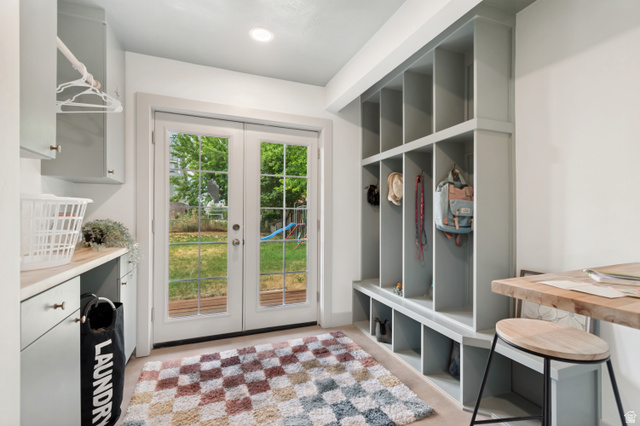 1010 West Maple Street Mapleton, UT 84664 - Photo 10 of 24 Mudroom featuring light-colored built-in cabinetry, an integrated bench, and individual storage cubbies