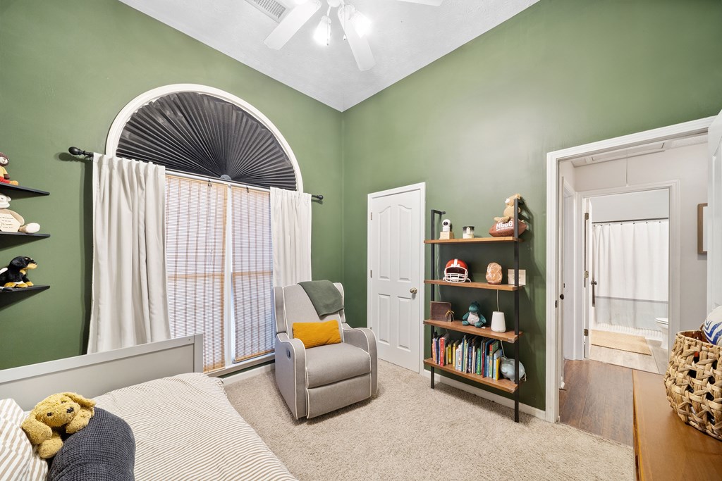 25 Peppertree Court Columbus, GA 31909 - Photo 24 of 42 a bedroom with furniture and a couch