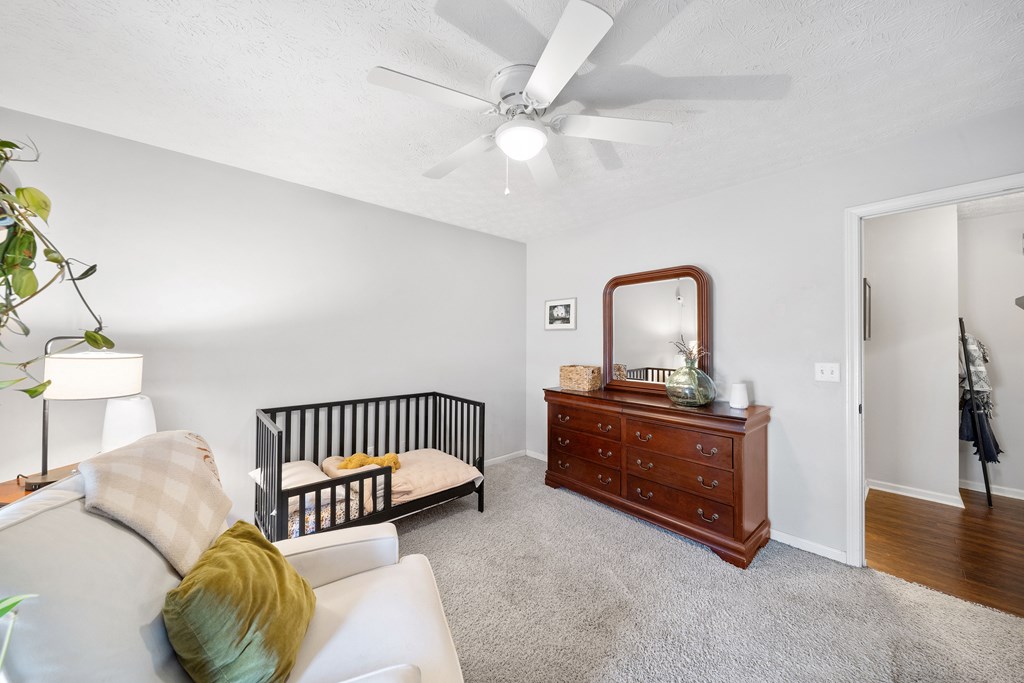25 Peppertree Court Columbus, GA 31909 - Photo 27 of 42 a bedroom with furniture and a window