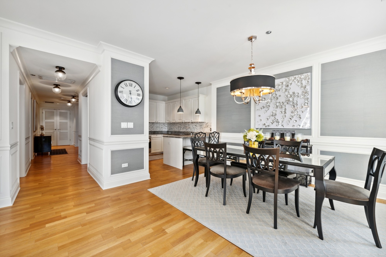 10 East Delaware Place, Unit 12E Chicago, IL 60611 - Photo 7 of 25 a view of a dining room and livingroom view