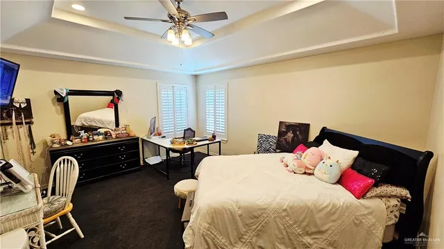 a bed room with a bed chair and a window