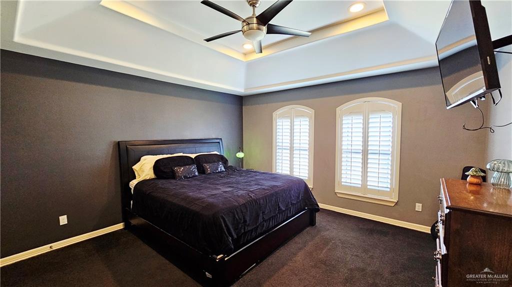 4711 North Stewart Road Palmhurst, TX 78573 - Photo 25 of 40 a bedroom with a bed and window