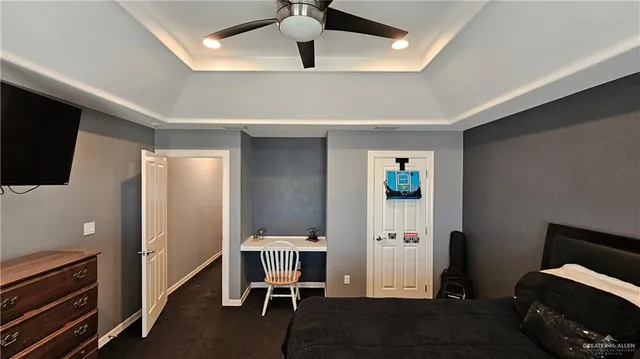 a view of a livingroom with furniture and staircase