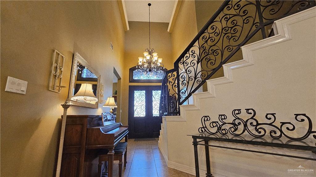 4711 North Stewart Road Palmhurst, TX 78573 - Photo 7 of 40 a view of an entryway with wooden floor