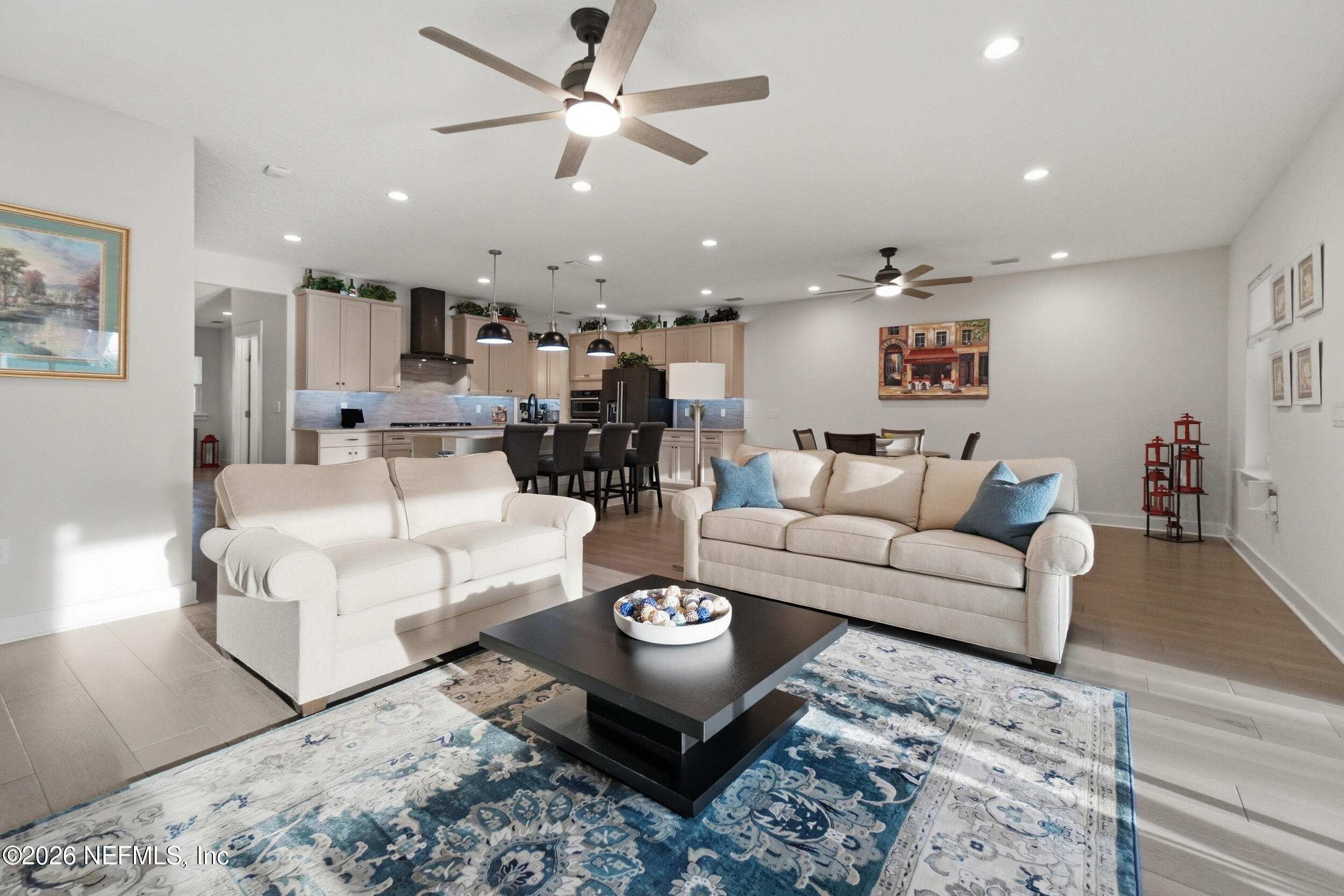 34 Red Rock Lane St. Johns, FL 32259 - Photo 21 of 71 a living room with furniture kitchen view and a chandelier