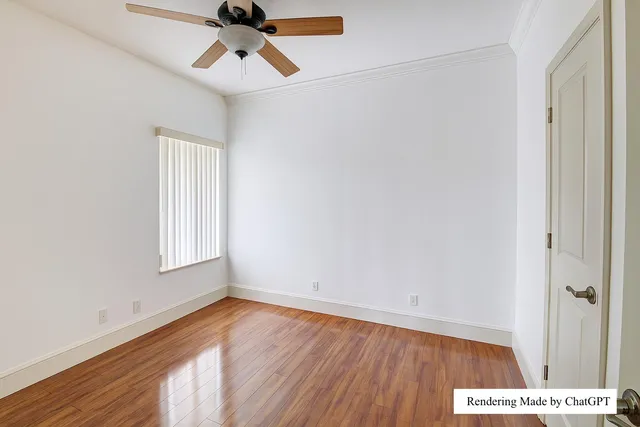 a view of a lake with houses in the back