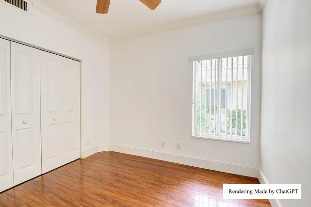 a view of a lake with houses in the back