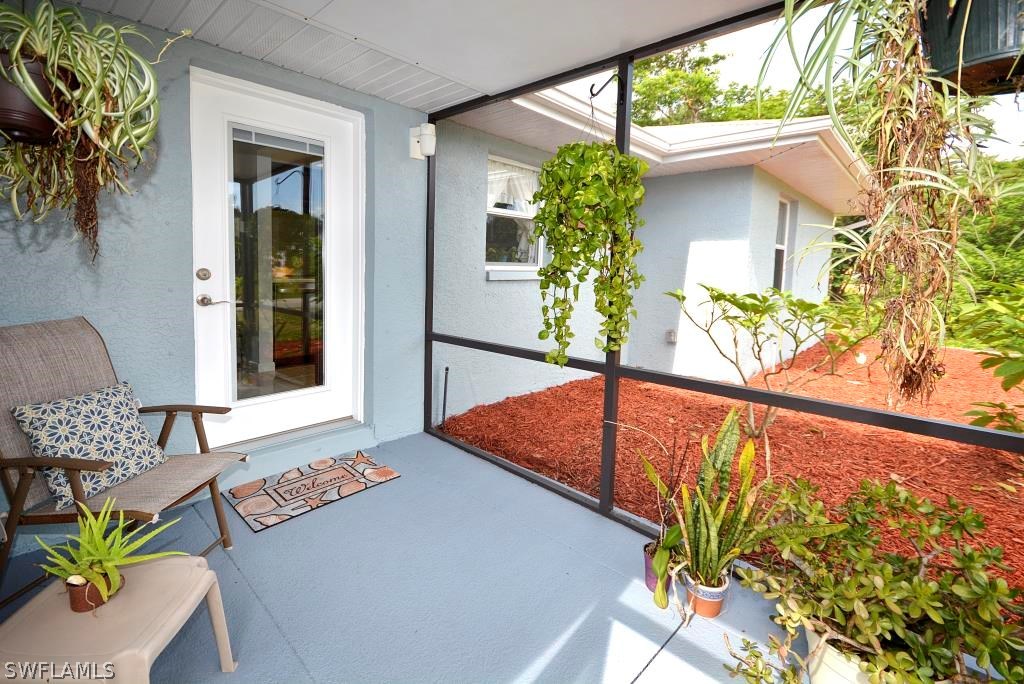 5919 Mackerel Road Bokeelia, FL 33922 - Photo 26 of 27 a outdoor living space with furniture