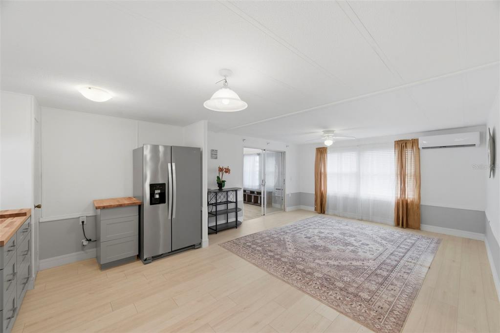 10810 Freedom Drive Port Richey, FL 34668 - Photo 12 of 65 a view of a kitchen with refrigerator and sink