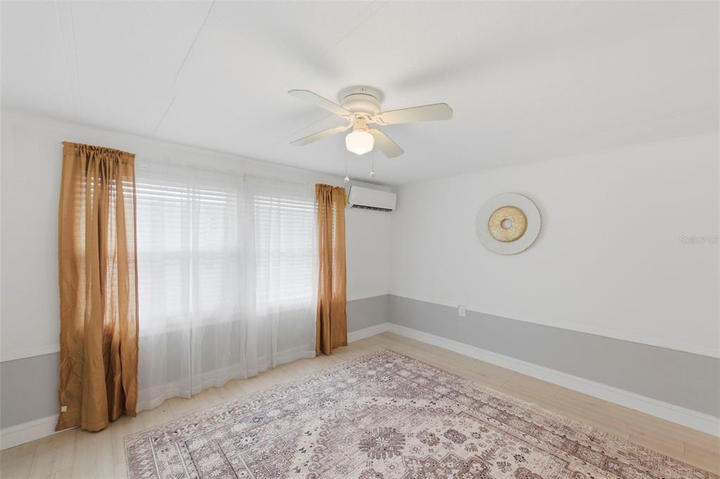 10810 Freedom Drive Port Richey, FL 34668 - Photo 17 of 65 a view of an empty room and window