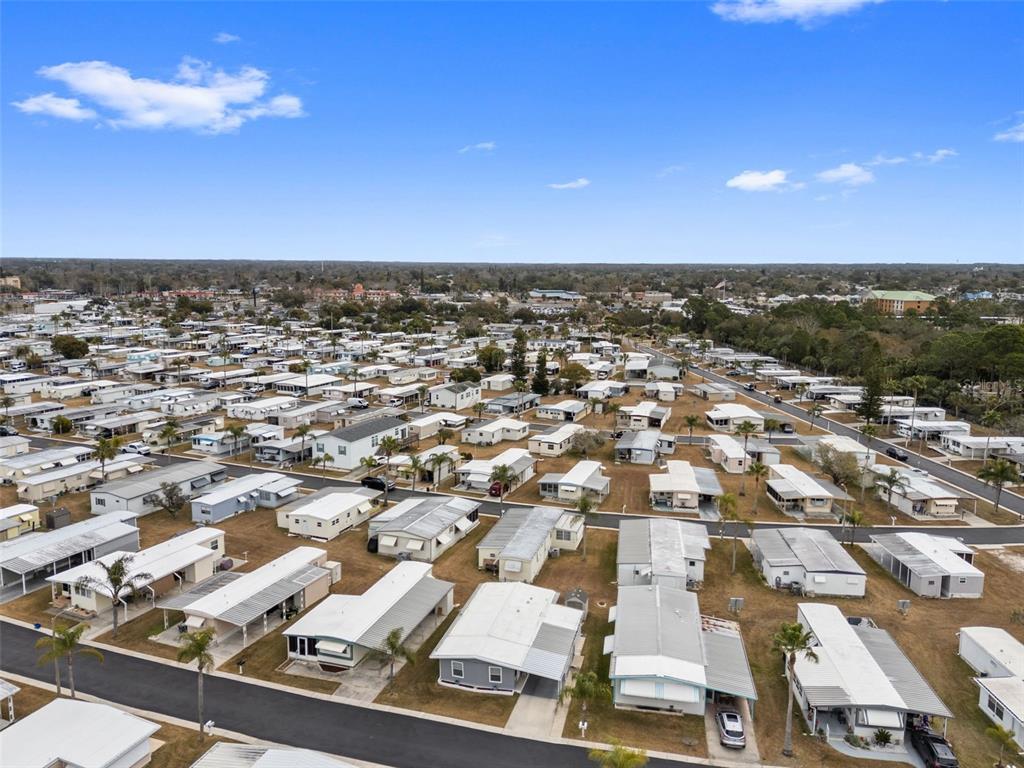 10810 Freedom Drive Port Richey, FL 34668 - Photo 41 of 65 an aerial view of residential building with parking space