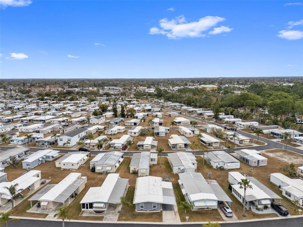 10810 Freedom Drive Port Richey, FL 34668 - Photo 42 of 65 an aerial view of residential building with parking space