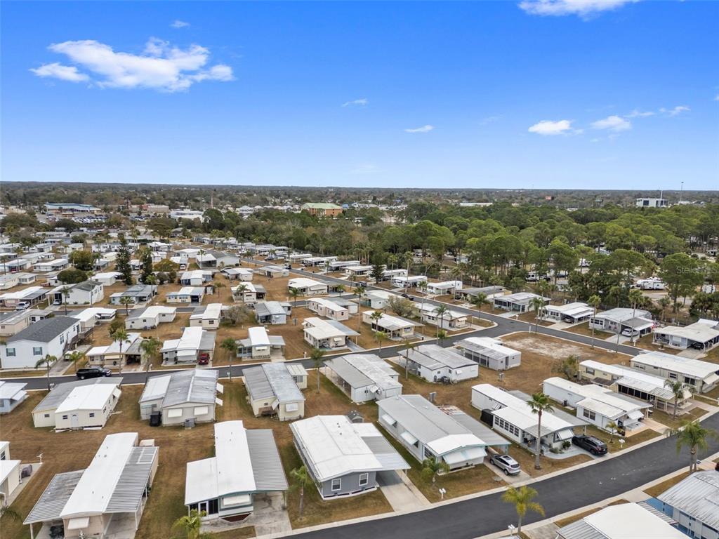 10810 Freedom Drive Port Richey, FL 34668 - Photo 43 of 65 an aerial view of residential building with parking space