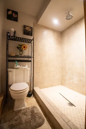a bathroom with a toilet a sink and a bathtub