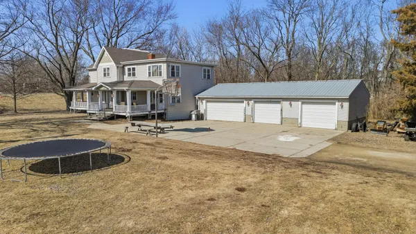 a front view of a house with yard