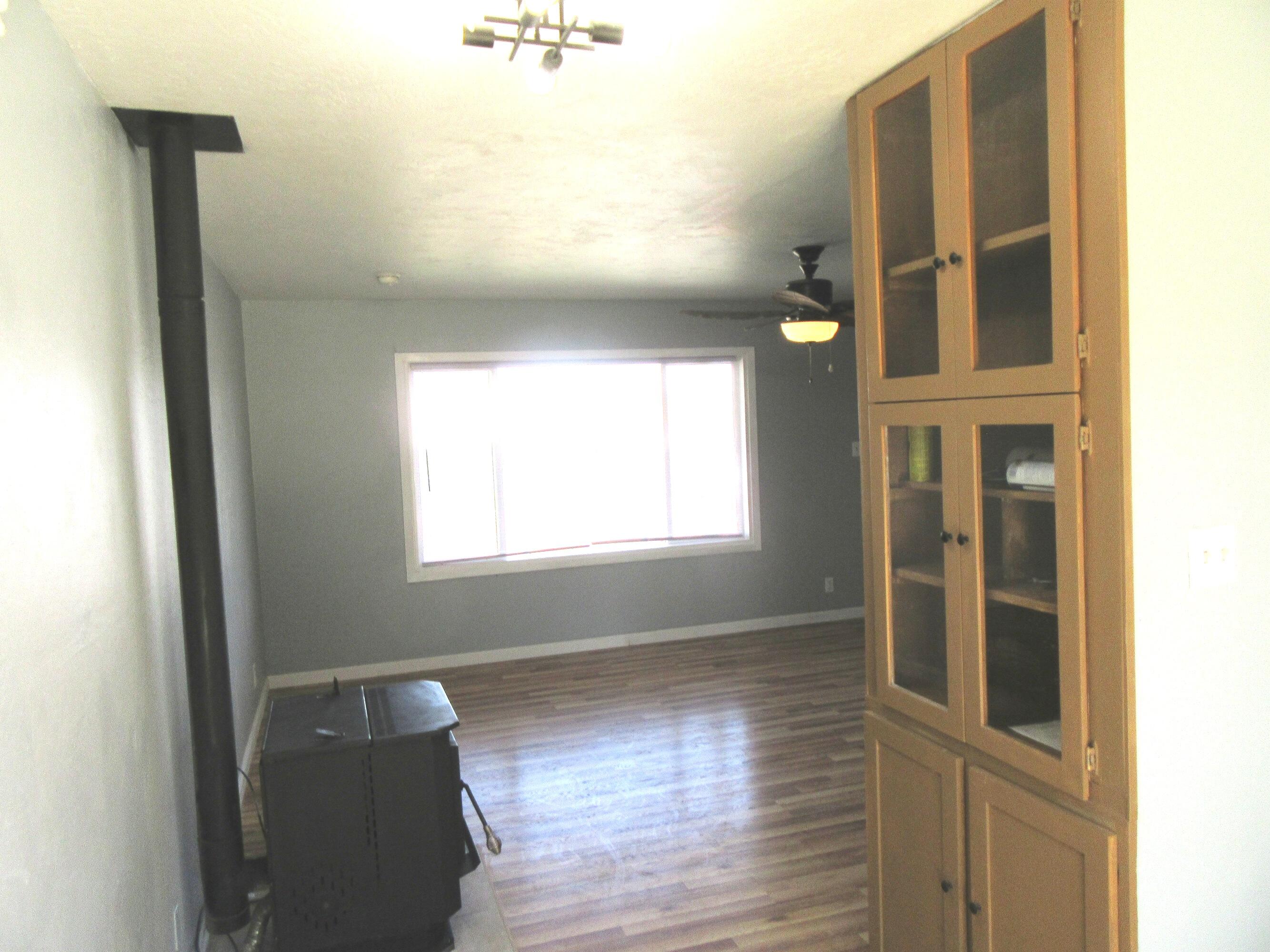 907 West 3rd Street Alturas, CA 96101 - Photo 6 of 32 China Cabinet and Pellet stove