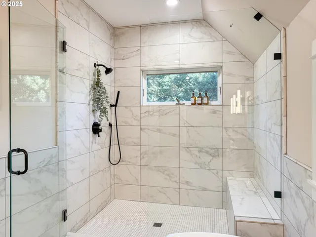 a bedroom with a bed and a table in it