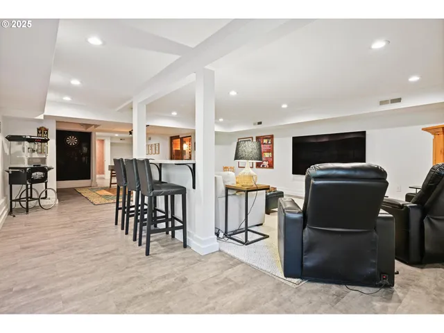 a bathroom with a shower curtain and a shower curtain