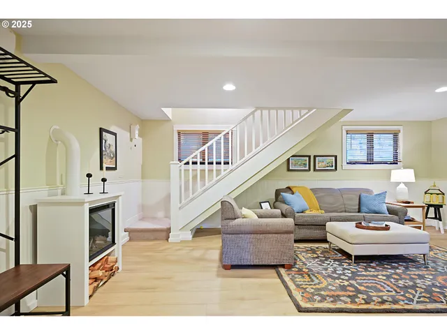 a bathroom with a sink mirror vanity and a bathtub