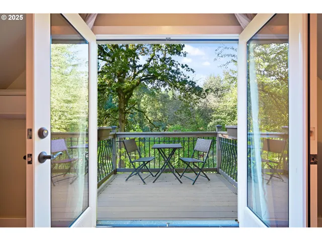 a view of a swimming pool with an outdoor seating and a yard