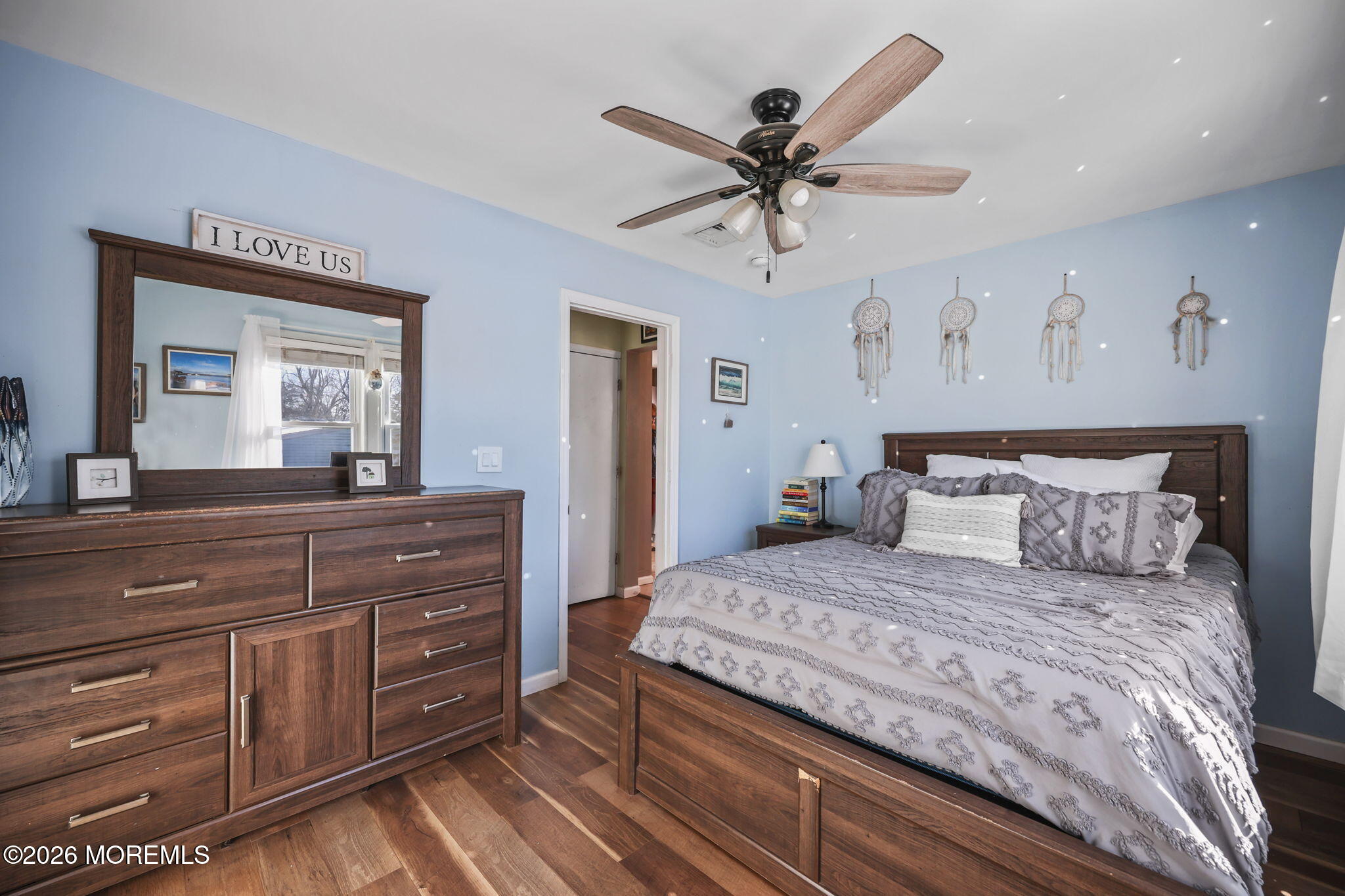 36 Cherry Street Tinton Falls, NJ 07724 - Photo 19 of 31 a bedroom with a large bed and a mirror on dresser