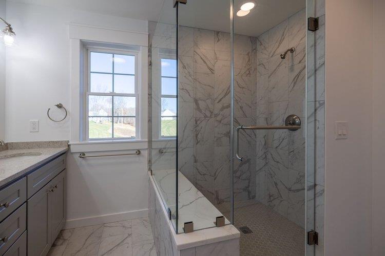 217 Old Hopewell Road Wappingers Falls, NY 12590 - Photo 11 of 17 a bathroom with a granite countertop sink a shower and a mirror