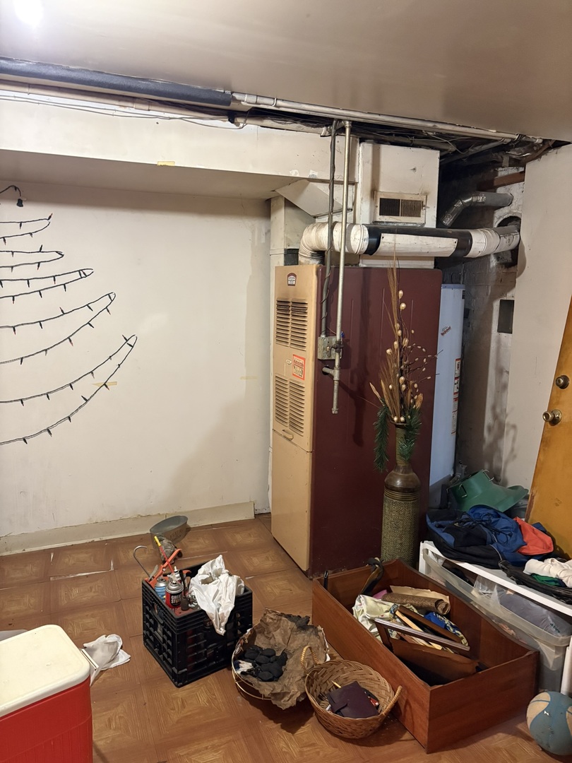 2016 West 52nd Street Chicago, IL 60609 - Photo 22 of 46 a room with furniture and storage