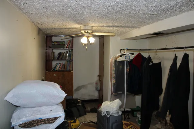 a room with furniture and storage