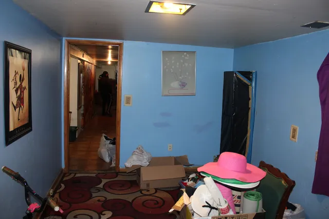 a room with furniture and gym equipment