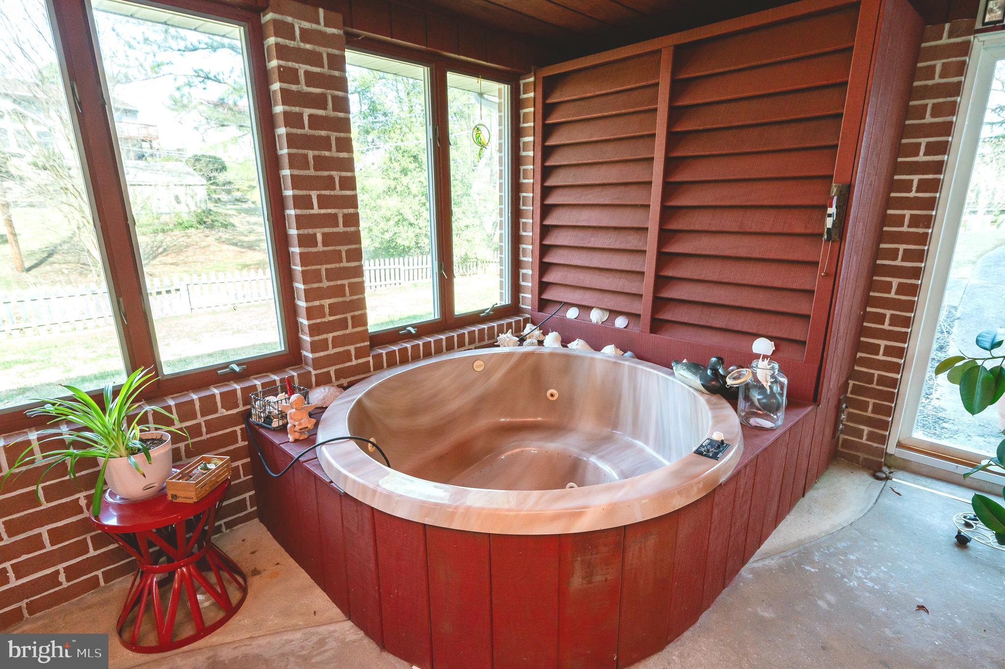 8337 Analee Avenue Rosedale, MD 21237 - Photo 41 of 48 a view of a bathtub in a bathroom