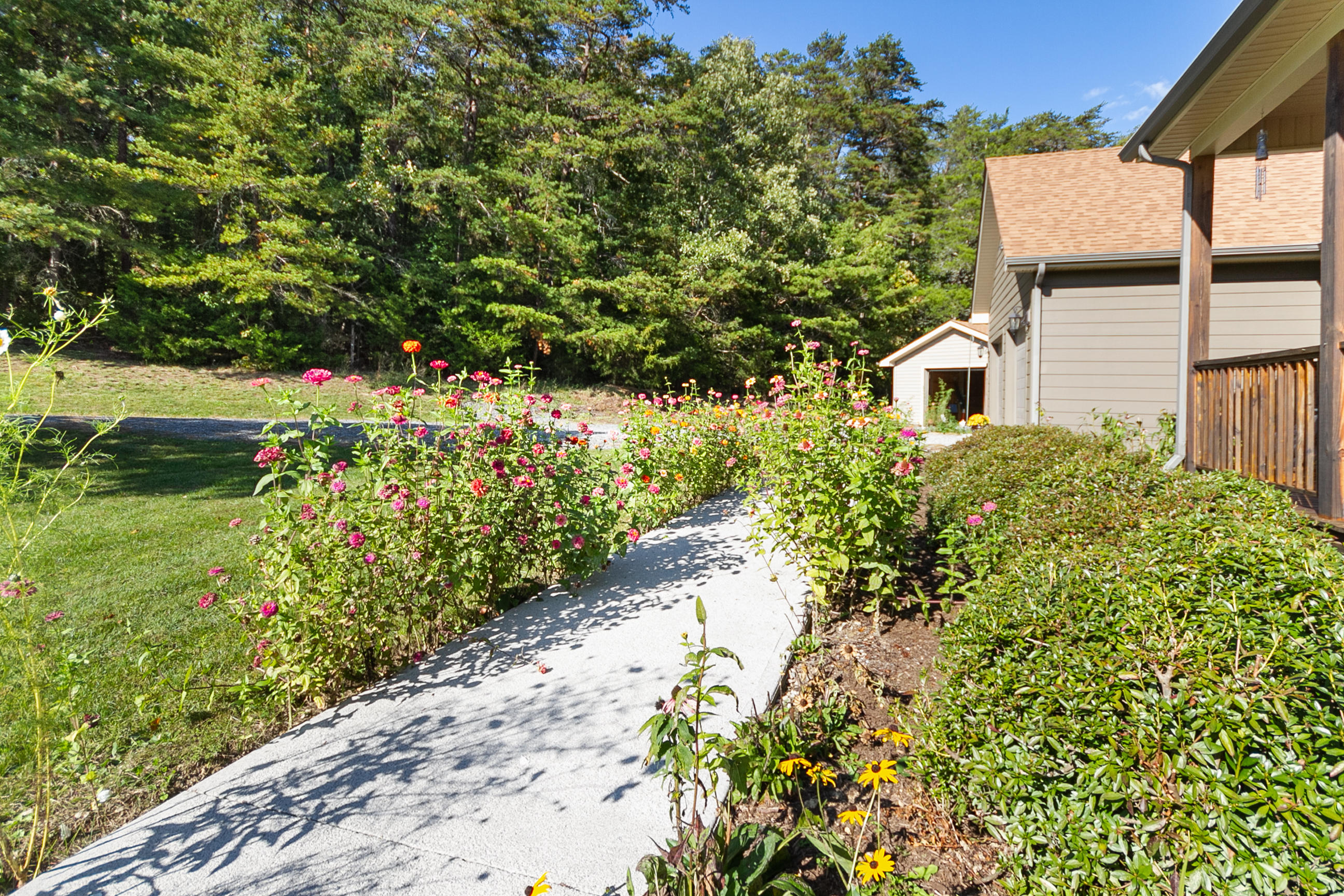 3950 Flatwoods Road Elliston, VA 24087 - Photo 15 of 94 a view of a house with a yard
