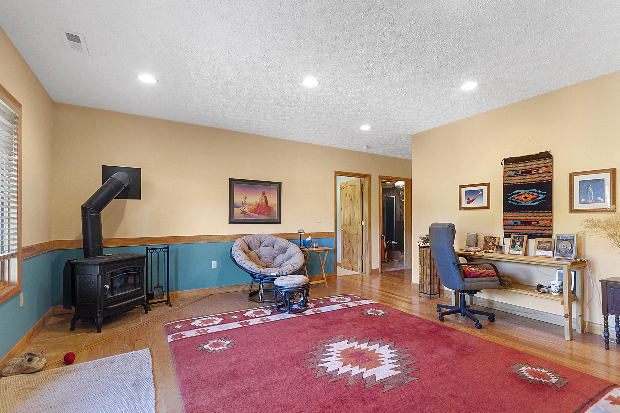 3950 Flatwoods Road Elliston, VA 24087 - Photo 68 of 94 a living room with furniture and a flat screen tv