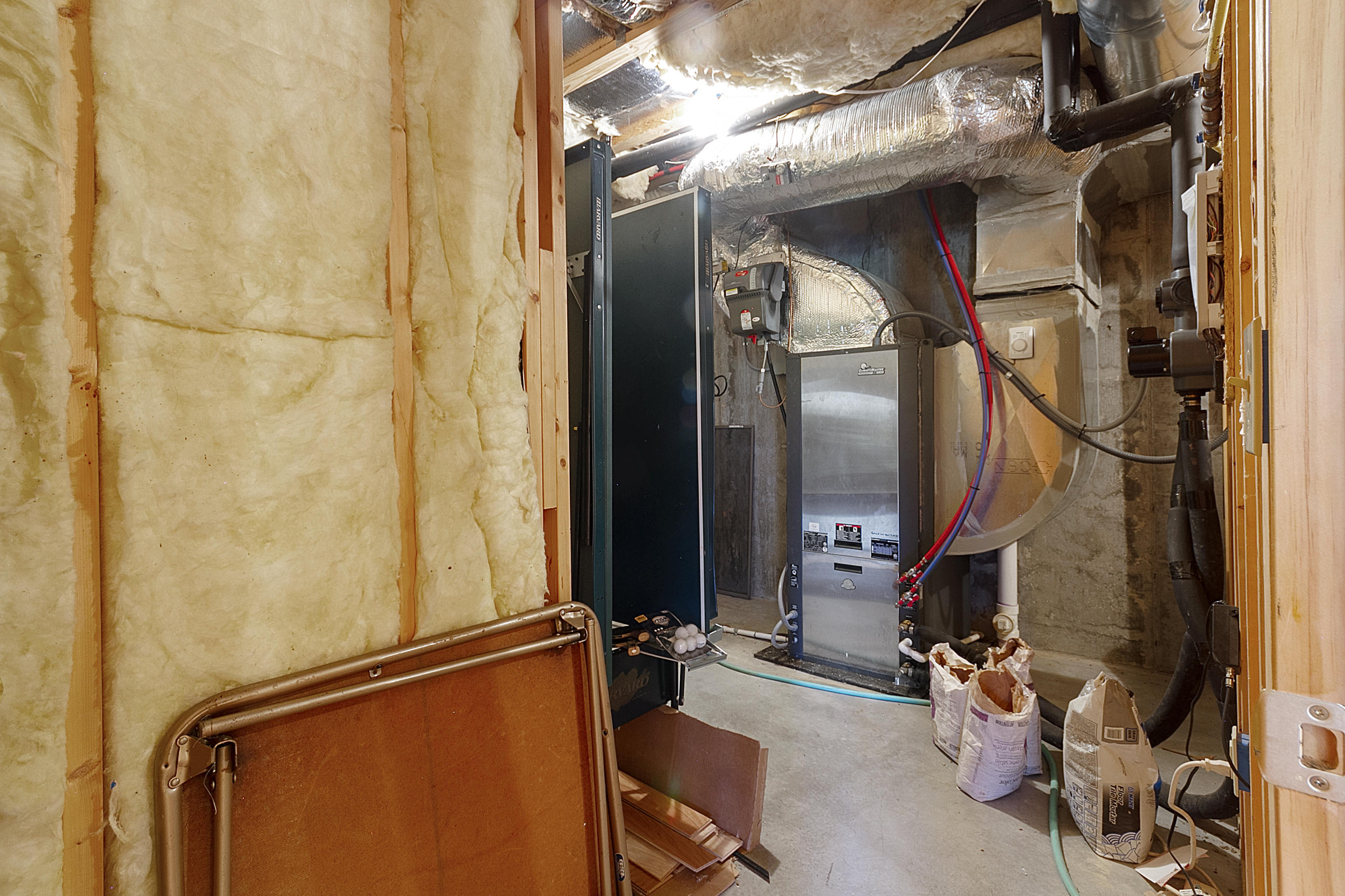 3950 Flatwoods Road Elliston, VA 24087 - Photo 78 of 94 a view of walk in closet with clothes and shoes