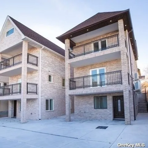 a front view of residential houses