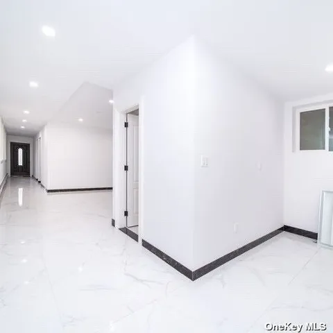 a view of entryway with white walls