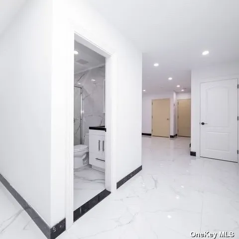 a view of a house with a yard and garage