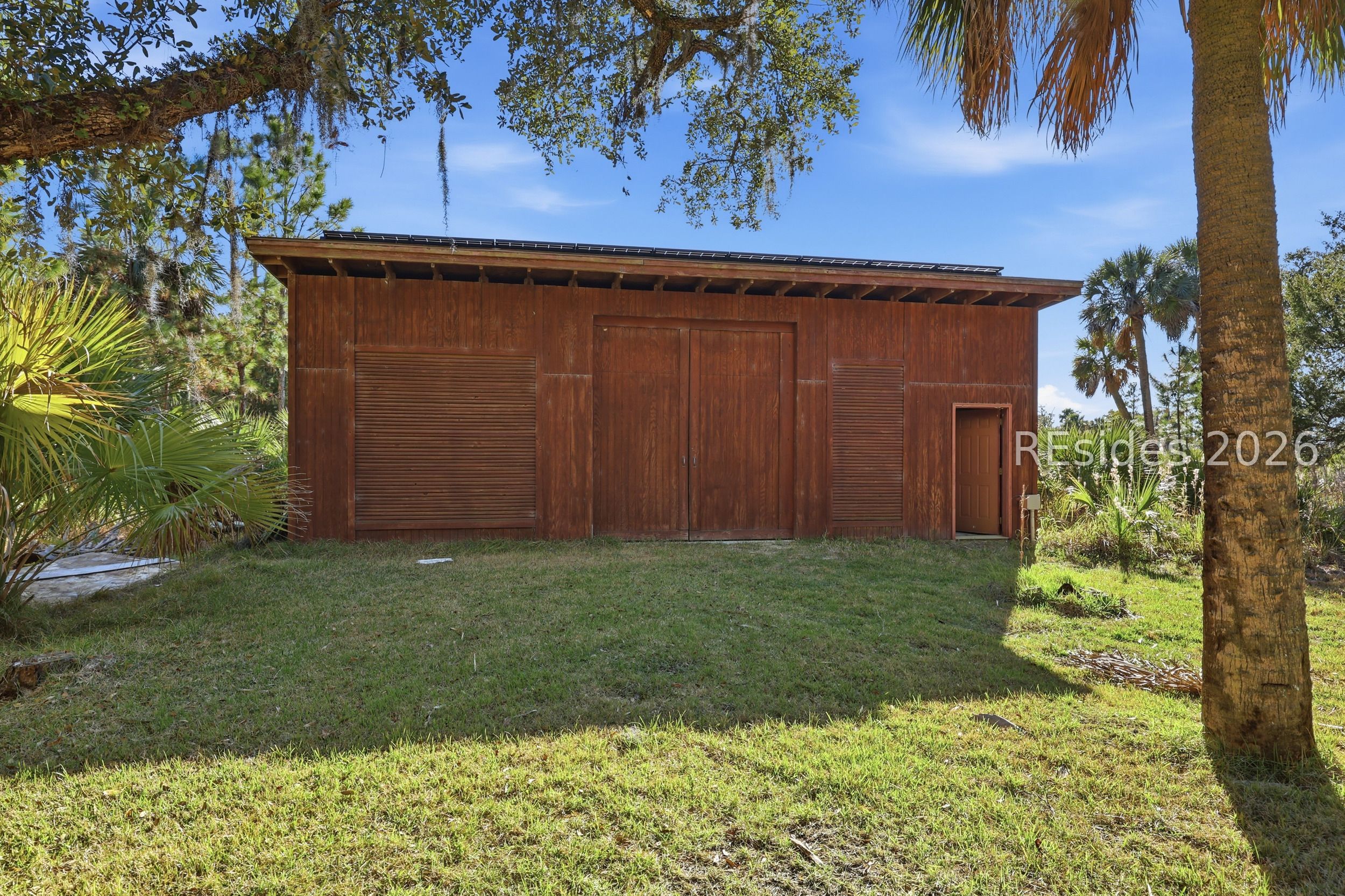 12 Rose Island Port Okatie, SC 29909 - Photo 6 of 11 Solar Panel Barn - Not on Lot 12