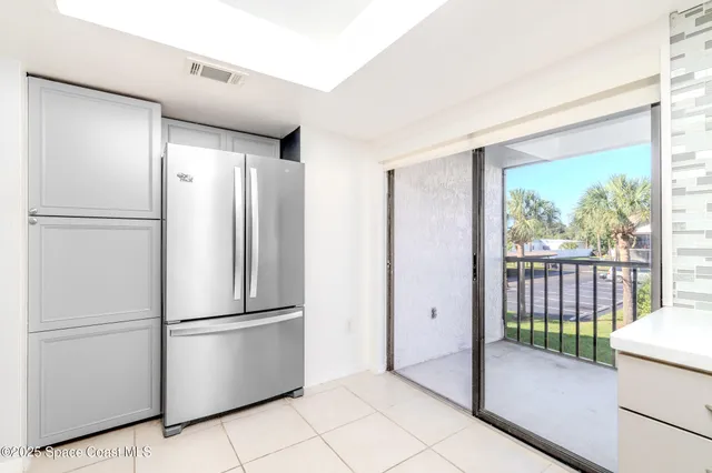 a refrigerator freezer sitting in a kitchen