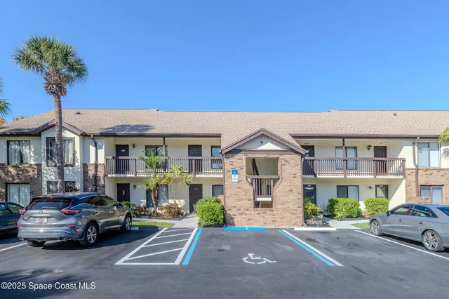 a car parked in front of a house