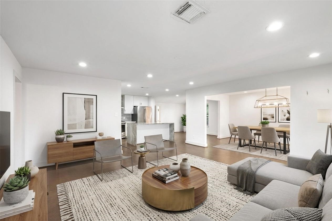 7307 Raton Street Houston, TX 77055 - Photo 6 of 23 The open concept design is great for entertaining, or enjoying a cozy evening at home! Modern LED recessed lighting offers additional brightness to an already bright and airy space! *Virtually Staged