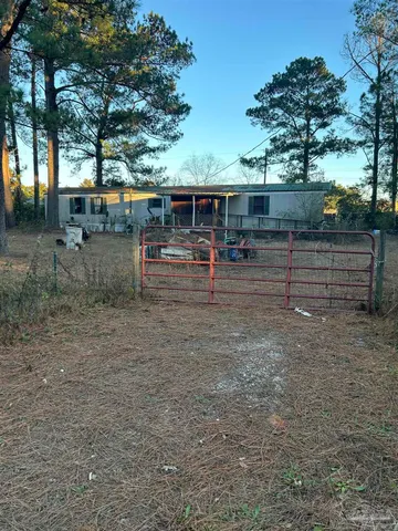 a view of house with outdoor space